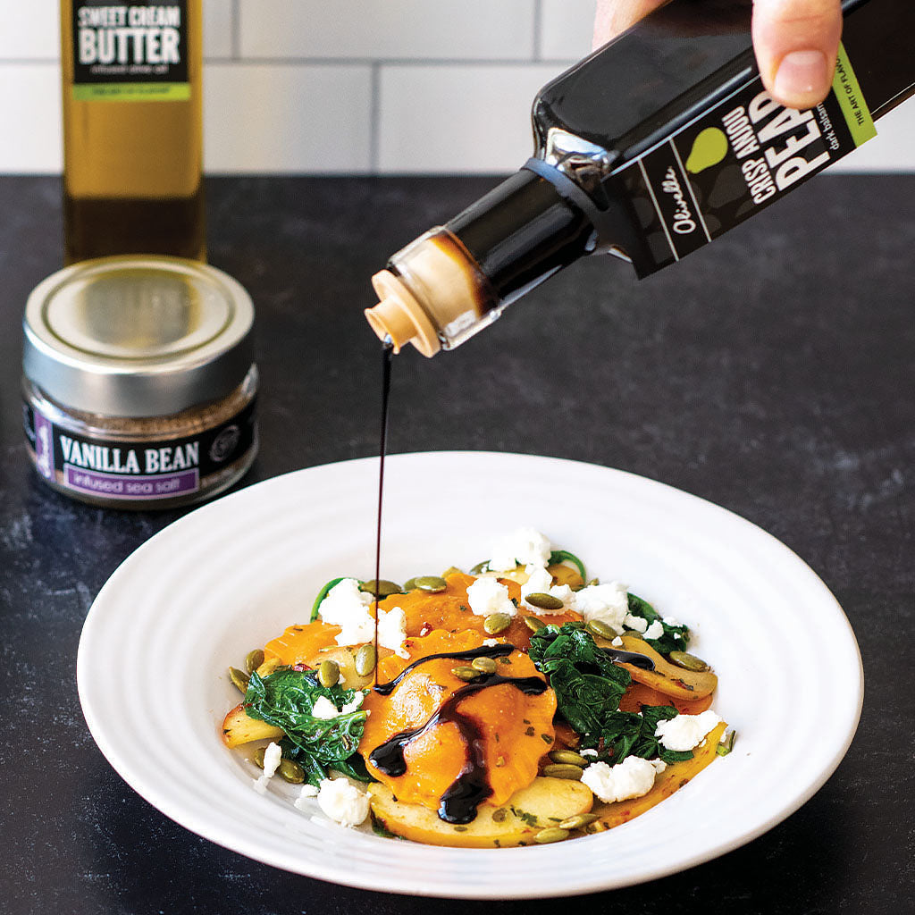 SQUASH RAVIOLI WITH SAUTEED APPLES AND A PEAR BALSAMIC DRIZZLE